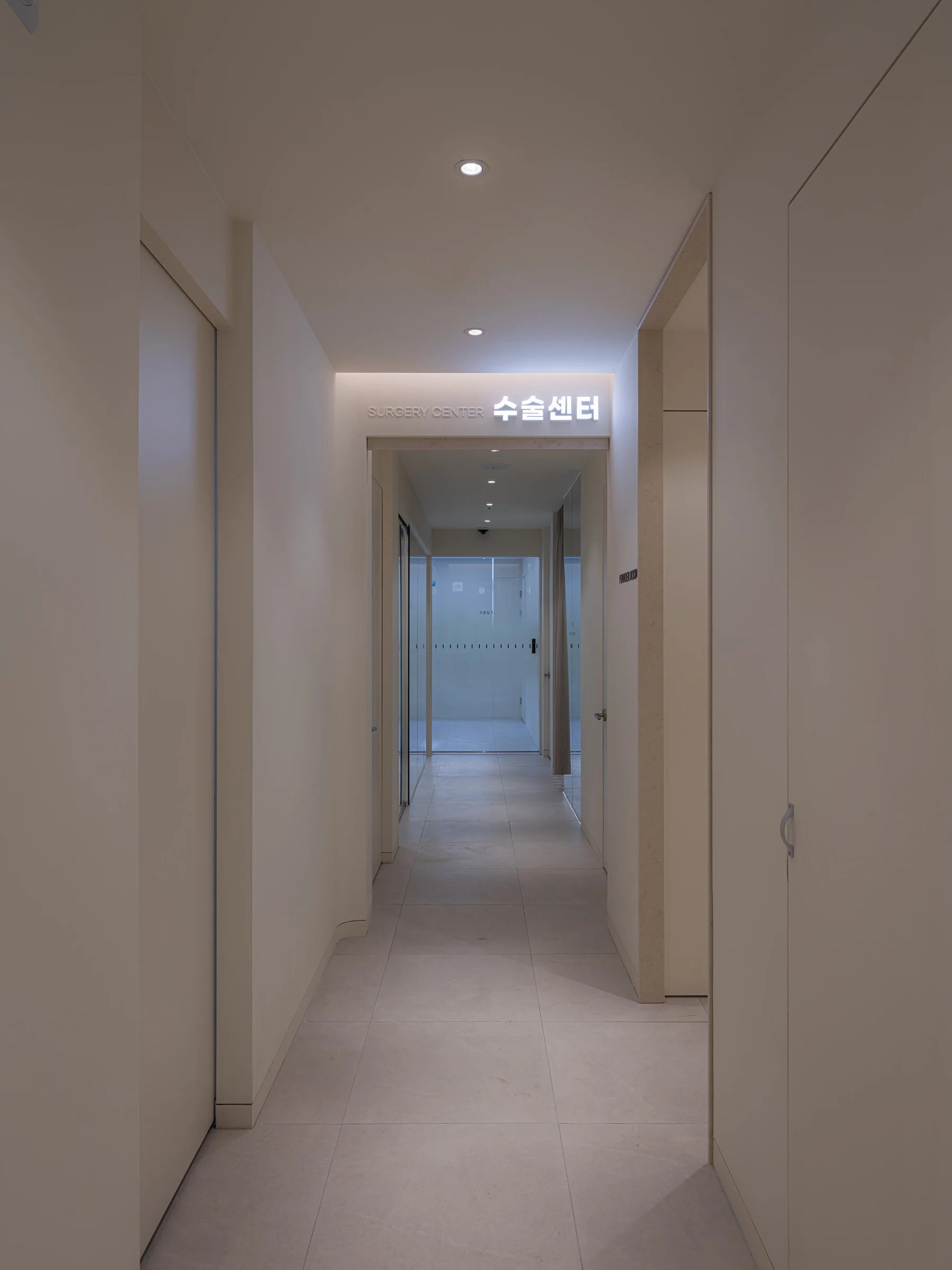 The entrance to the surgery centre, marked with an illuminated Surgery Center sign