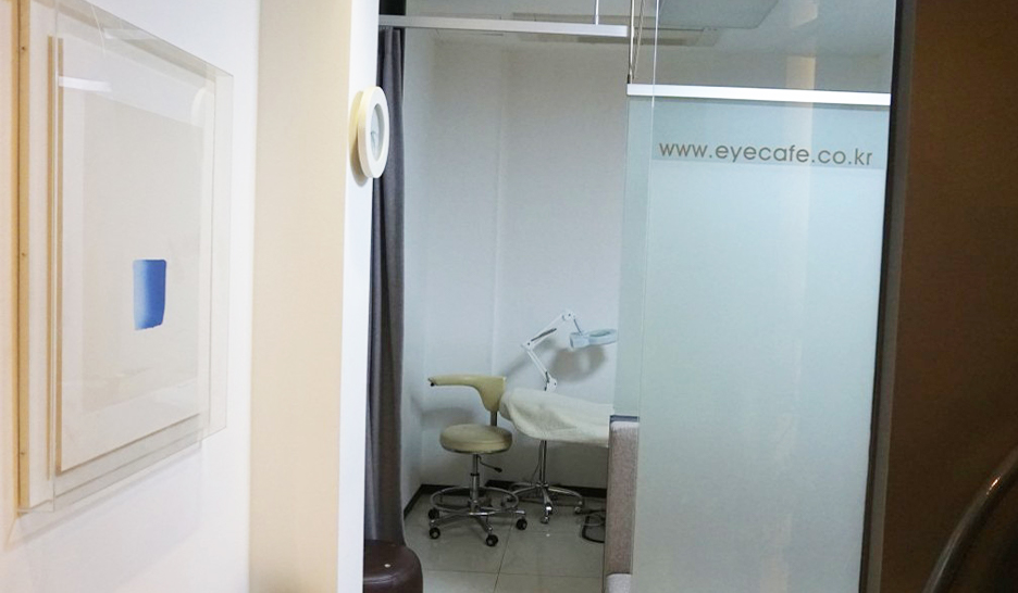 Corridor with frosted glass doors leading to the treatment and operating rooms